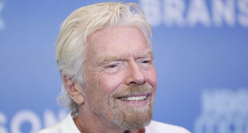 Richard Branson shows off nasty injury as he is pictured with face cut open