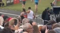 Rogue runner strikes again! Tommy Fury is caught PUSHING Great North Run rival away to get his perfect viral finish line video, days after 'LYING' about completing 100km triathlon