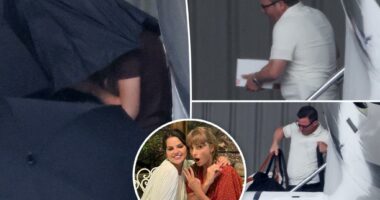 Taylor Swift hides under umbrellas as she lands in California for BFF Selena Gomez’s wedding