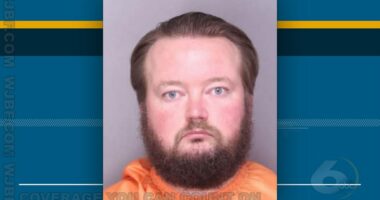 Teaching assistant charged with spraying fecal odor at South Carolina school