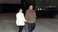 North Korean leader Kim Jong Un inspects an intercontinental ballistic missile (ICBM) with his daughter in this undated photo released in November 2022.