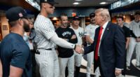 Trump draws cheers and boos while marking 9/11 by attending a New York Yankees game