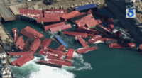 Video: Dozens of cargo containers spill into California port