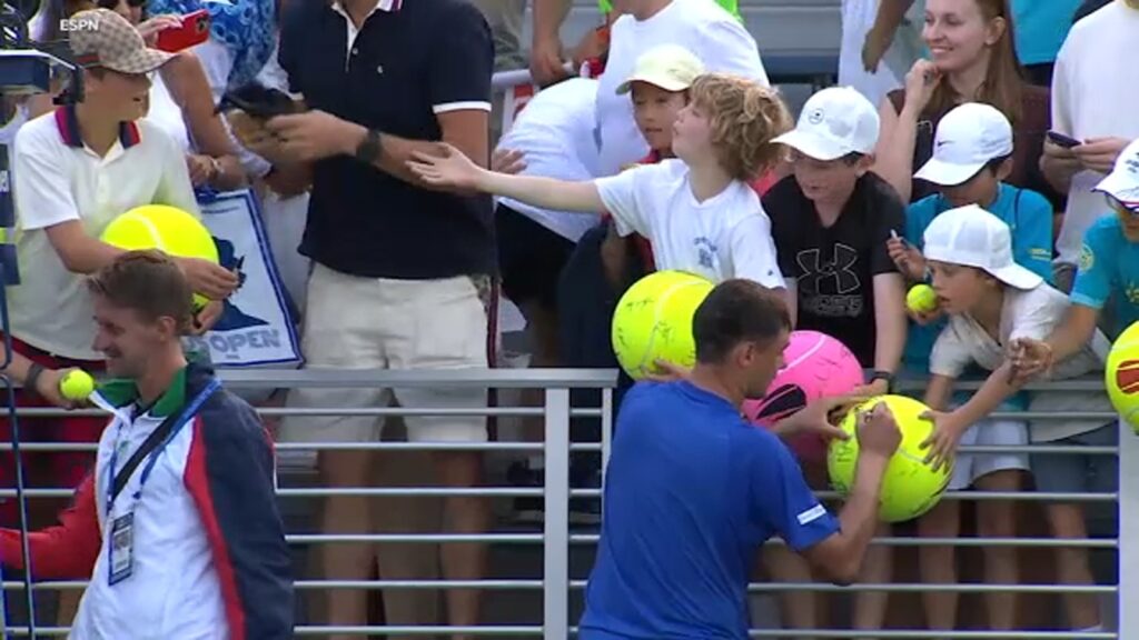 Video goes viral after Polish millionaire snatches signed hat from child at US Open