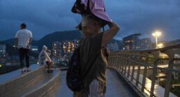 Weaker Ragasa pushes across China's southern coast toward Vietnam after causing flooding