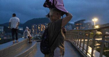 Weaker Ragasa pushes across China's southern coast toward Vietnam after causing flooding