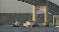 A search crew and divers recovered the body and car of Leslie Pluhar on Sept. 30, 1989, eight days after her vehicle plunged 170 feet off the Mackinac Bridge and into the Straits of Mackinac. (WOOD TV8 file/Courtesy WDIV)