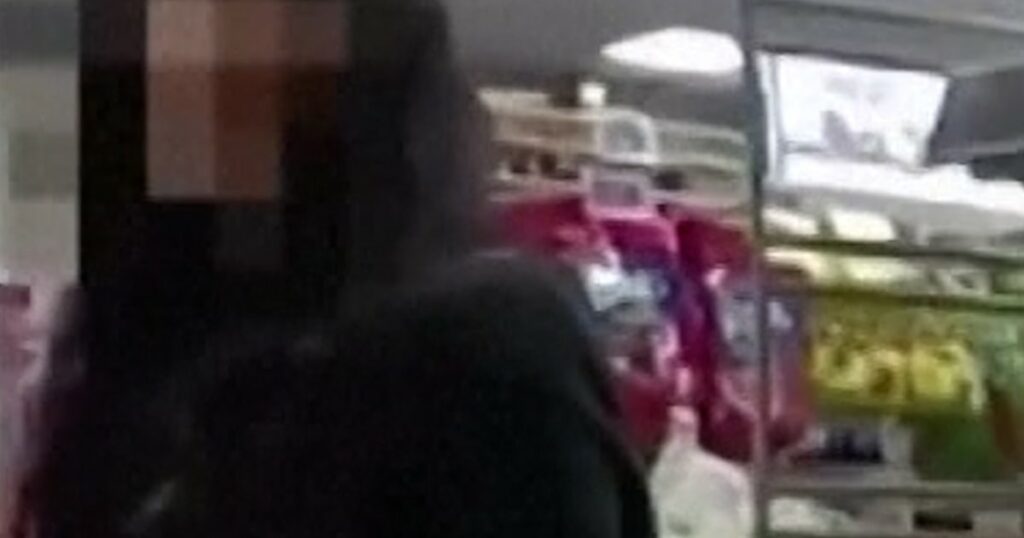 Woman's hand signal for help leads to arrest