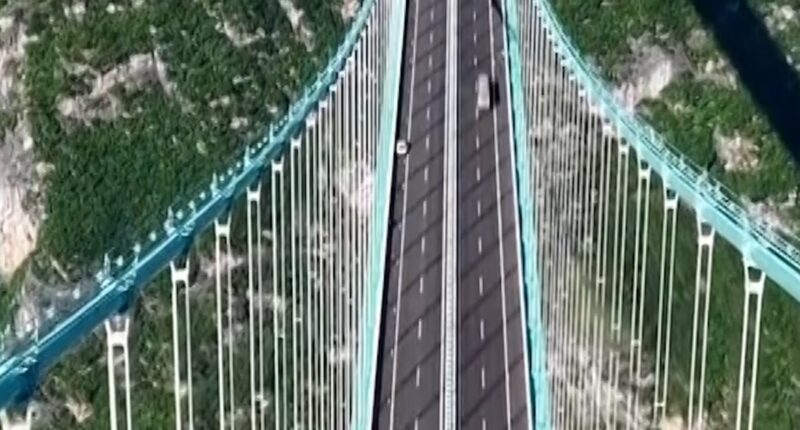 World's tallest bridge opens to traffic in China