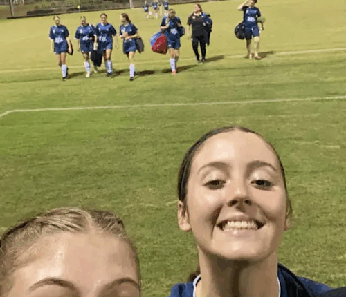 Finley Bone, right, has been remembered as a much loved member of her local football club.