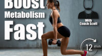 Side view of female bodybuilder training legs using dumbbells. Concentrated fit sportswoman with muscular body doing lunges in empty gym, loft interior. Concept of bodybuilding, healthy lifestyle. 12-Minute Standing Strength Routine That Recharges Your Metabolism After 50. Cover