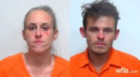 2 arrested in death of toddler who showed signs of abuse, police say