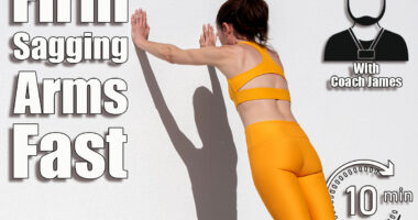 Sporty woman doing push off exercises against a wall, 5 Quick Exercises That Firm Sagging Arms Better Than Weights After 40. Cover