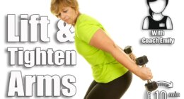 Mature woman lifting weights on a white background. 5 Triceps Exercises That Lift Sagging Arms After 50 (At Home). Cover