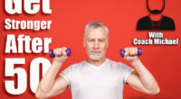 Portrait Of A Senior Man Exercising with dumbbells against red Background. 7 Standing Exercises Men Over 50 Should Do Daily To Stay Strong, Lean & Fit. Cover