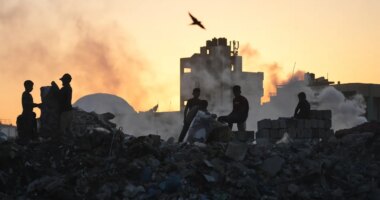 Palestinians search for firewood and plastic at a landfill in Gaza City Saturday, Oct. 25, 2025. (AP Photo/Abdel Kareem Hana)