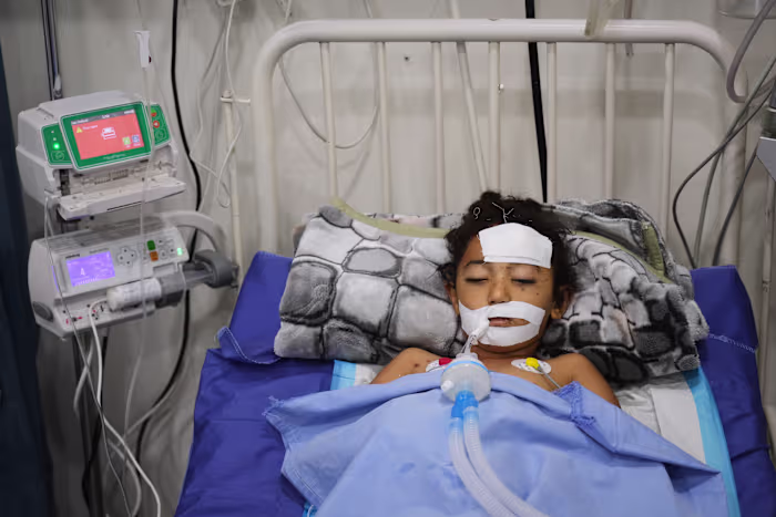 A bomb in Gaza's rubble wounds twins who thought it was a toy