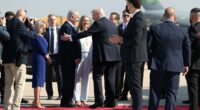 Air Force One touches down as hostages begin to be released