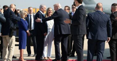 Air Force One touches down as hostages begin to be released