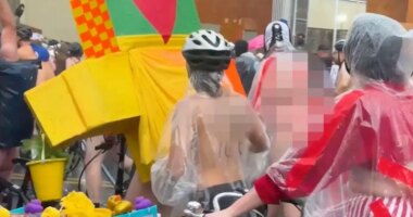 Bare-bottomed bikers roll through rain to shout at feds in blue city's latest anti-ICE stunt