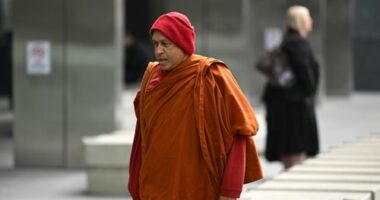 Naotunne Vijitha arrives to the County Court of Victoria in Melbourne, Wednesday, October 8, 2025. Openings expected in trial of 68-year-old Keysborough man Naotunne Vijitha, charged with a total of 19 offences relating to six alleged victims. He is the chief incumbant monk at a Keysborough Sri Lankan temple. (AAP Image/James Ross)