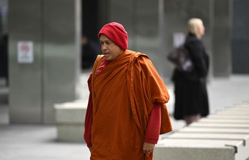 Naotunne Vijitha arrives to the County Court of Victoria in Melbourne, Wednesday, October 8, 2025. Openings expected in trial of 68-year-old Keysborough man Naotunne Vijitha, charged with a total of 19 offences relating to six alleged victims. He is the chief incumbant monk at a Keysborough Sri Lankan temple. (AAP Image/James Ross)
