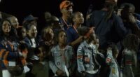 CAM NEWTON CELEBRATES JERSEY RETIREMENT WITH HIS KIDS BY HIS SIDE