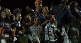 CAM NEWTON CELEBRATES JERSEY RETIREMENT WITH HIS KIDS BY HIS SIDE