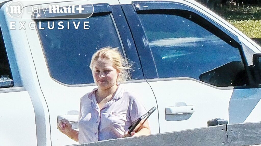 Cheerleader who 'hid dead baby' seen in pajamas during house arrest