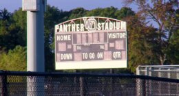 Coach tackled, concussed 8th grade football player, mom says