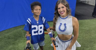 Colts cheerleader uses sign language to converse with deaf fan at his first game
