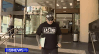 Cops label bikie 'middle-aged man playing dress-ups' over Nazi tat charge