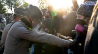 DHS says ICE agents in Chicago suburb 'boxed in by 10 cars' as tensions escalate
