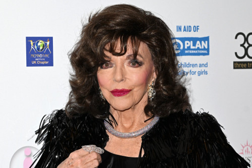 Dame Joan Collins 'couldn't resist' having 15th godchild