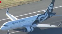 An Air New Zealand plane driving along the runway of Sydney Airport.