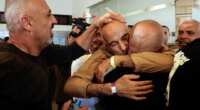 Freed Palestinian prisoner embraces loved ones