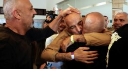 Freed Palestinian prisoner embraces loved ones
