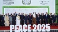 President Donald Trump and other leaders gather for a family photo during a summit to support ending the more than two-year Israel-Hamas war in Gaza after a breakthrough ceasefire deal, Monday, Oct. 13, 2025, in Sharm El Sheikh, Egypt. (AP Photo/Evan Vucci, Pool)
