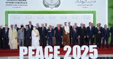 President Donald Trump and other leaders gather for a family photo during a summit to support ending the more than two-year Israel-Hamas war in Gaza after a breakthrough ceasefire deal, Monday, Oct. 13, 2025, in Sharm El Sheikh, Egypt. (AP Photo/Evan Vucci, Pool)