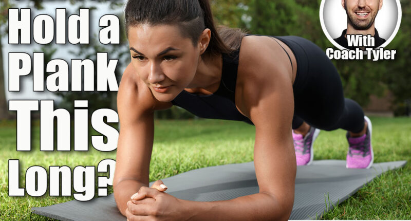 Young woman doing plank exercise on grass in park. If You Can Hold a Plank This Long After 60, Your Abs Are Better Than Most. Cover