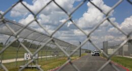 Immigration detention center shooting suspects face terror charges