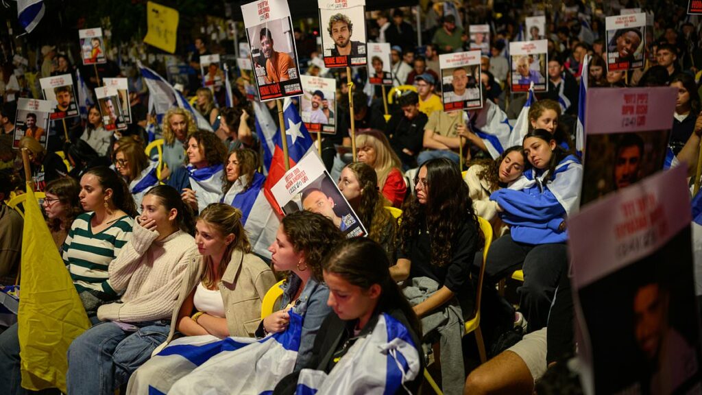 Israelis gather to welcome home the last living hostages from Gaza
