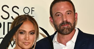 Jennifer Lopez and Ben Affleck get VERY cozy at  premiere