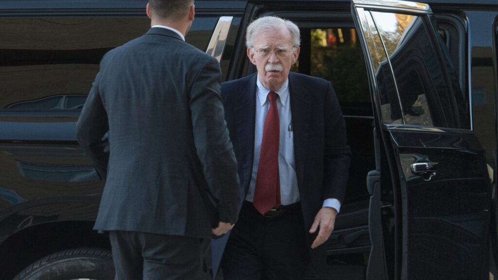 John Bolton arrives at court to surrender to authorities on charges in classified information case