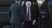 John Bolton arrives at court to surrender to authorities on charges in classified information case
