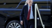 John Bolton, ex-Trump adviser, turns himself in on criminal charges