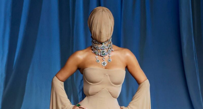 Kim Kardashian's eight-word outburst as she 'loses it' in jaw-dropping 'faceless' outfit