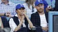 Lip Reader Decodes What Prince Harry and Meghan Were Saying to Each Other After Getting Booed at World Series Game