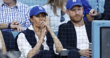 Lip Reader Decodes What Prince Harry and Meghan Were Saying to Each Other After Getting Booed at World Series Game