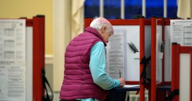 FILE - A voter marks a ballot at the polling station in Kennebunk, Maine, March 5, 2024. (AP Photo/Michael Dwyer, File)
